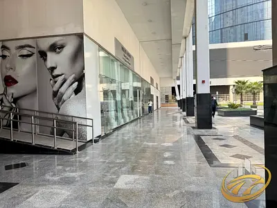 متجر شل آند كور | برج ذا إكستشينج | إطلالات على القناة والأفق