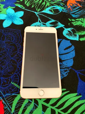 iPhone 6s Plus for sale. Has cracks and the screen is blacked out on the side.