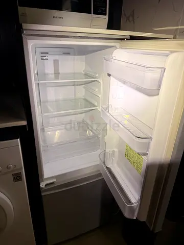 Small single-door refrigerator in perfect working condition