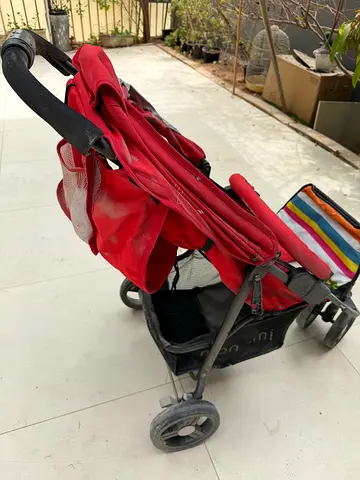 Red lightweight foldable baby stroller — used, good condition