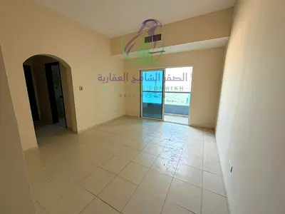 One bedroom apartment with a living room for annual rent in Al Mamzar Sharjah Balcony overlooking Al Khan Corniche Spacious layout Modern finishes Pri