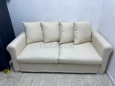 Cream 2-Seater Sofa bed with Removable Cushions — Good Condition