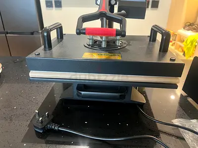 Heat press with slide tray and accessories
