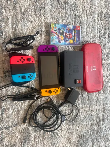 Excellent Nintendo Switch console with Joy‑Cons, dock, charger, Mario game and case - used