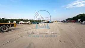 Investment Land | 100K Sq. Ft. | AED 12/Sq. Ft. Negotiable | Main Road
