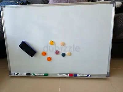 Whiteboard with markers, eraser and magnets - good condition