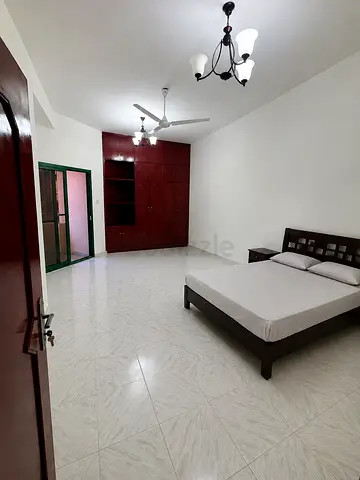 Spacious Furnished Family Room with Private Balcony – Bur Dubai
