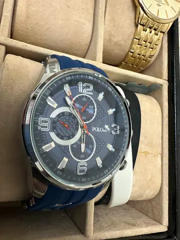 Polo wristwatch with blue rubber strap and chronograph dial - used