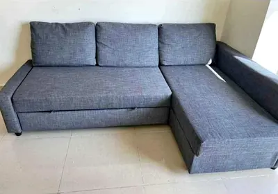 Grey L-shaped Sofa Bed with Storage — Good Condition