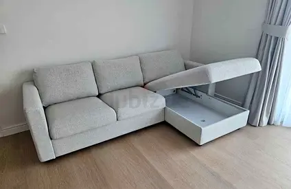 Light grey 3-seater sofa with storage chaise, good condition