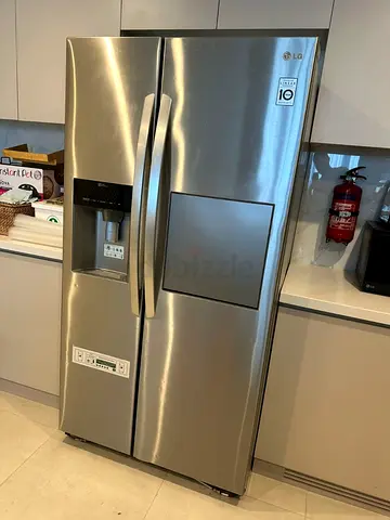 LG Side By Side Refrigerator With Water Dispenser Ice Maker Also Mini Bar