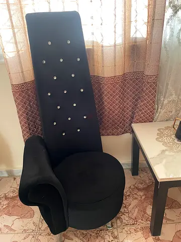 Black High-Back Accent Chair with Crystal Buttons and table