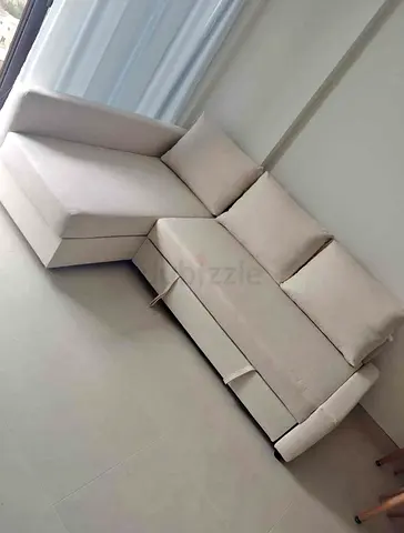 Light beige L-shaped sectional sofa bed- good condition