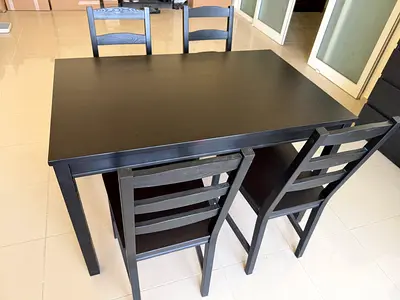 Solid Black Wooden Dining Table with 4 Chairs - Good Condition