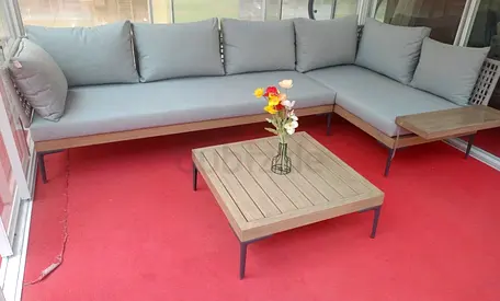Outdoor L-shaped sofa set with coffee table - light grey cushions