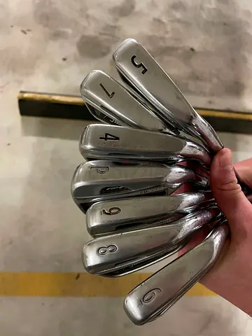 Set of 1" longer golf irons and Scotty Cameron putter (4-P, 5, 6, 7, 8, 9) — used, good condition.