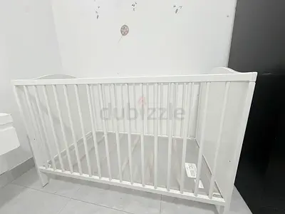 IKEA White wooden baby crib / cot in good condition