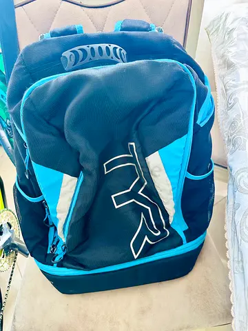 Black and blue large backpack with multiple compartments - good condition
