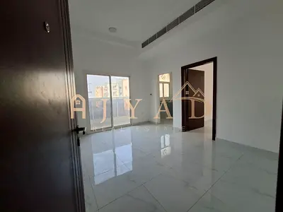 Annual rent: 1BR in Al Alia, master bedroom, 2 baths, central AC, balcony, easy payments, great price, convenient Dubai exit.