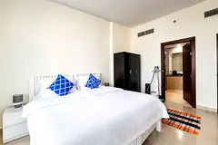 Spacious Master bedroom with attached toilet and attached balcony for one woman