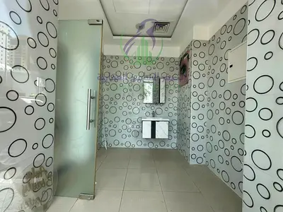 Spacious luxury commercial shop for annual rent on Al Taawun Street near Al Taawun Roundabout with a glass frontage on the main road