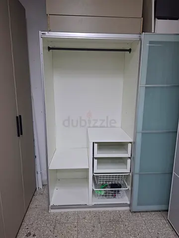 Spacious white sliding door wardrobe