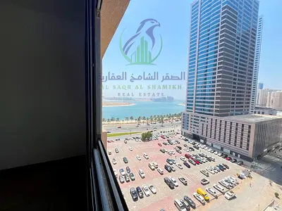 One Bedroom Apartment with Living Room in Al Khan Free AC Free Parking Free Gym Free Swimming Pool Built in Wardrobes Balcony Sea View