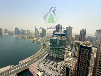 Two Master Bedrooms and Living Room in Al Majaz 3 with Free Parking Gym and Swimming Pool Balcony Store Room Hallway Direct Sea View Prime Location