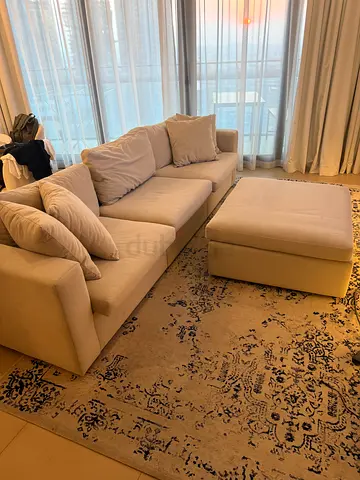 300cm Light beige L-shaped sofa with ottoman - good condition