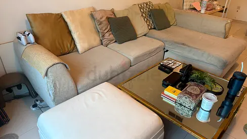 Light Beige L-Shaped Corner Sofa with Ottoman — Good Condition