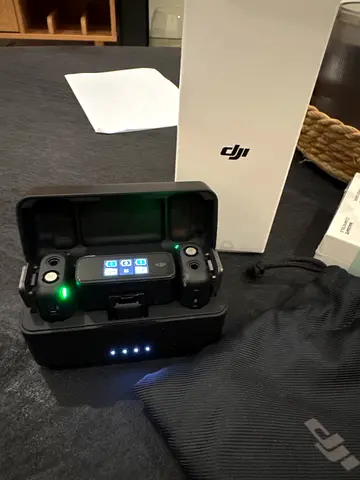 DJI Mic, RX receiver requires a battery replacement. Everything else is in good working condition