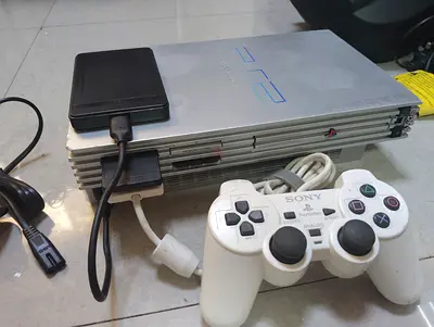 Playstation 2 Fat with 100+ games