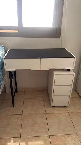 Compact white study desk with storage drawers and black glass top