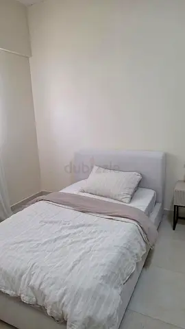 Single upholstered bed with mattress and bedding - good condition