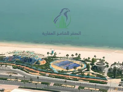 One bedroom apartment for annual rent in Al Mamzar Sharjah free gym free swimming pool free parking laundry room and storage room balcony sea view spa