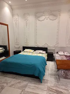 Spacious, neat & furnished master bedroom with attached bath in a central ac (2) bedroom villa.