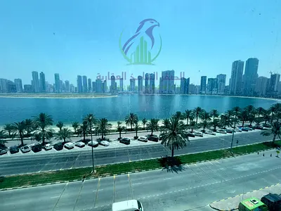 One bedroom apartment with a living room for annual rent in Al Mamzar Sharjah Free parking Balcony overlooking Al Mamzar Corniche Spacious layout Mode