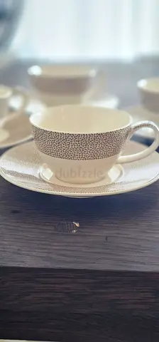 Set of ceramic coffee cups and saucers - 5 pieces