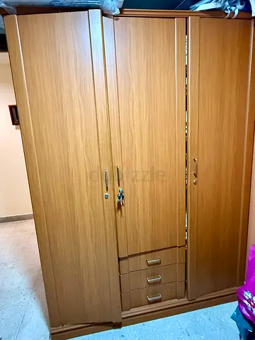 3 door wooden cupboard with 3 drawers