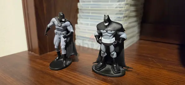 Two Batman Action Figures - Black & Grey, pre-owned