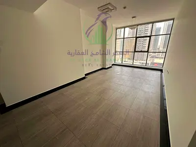 Three bedroom apartment with a living room for annual rent in Al Taawun Sharjah free gym free swimming pool free parking built in wardrobes balcony op
