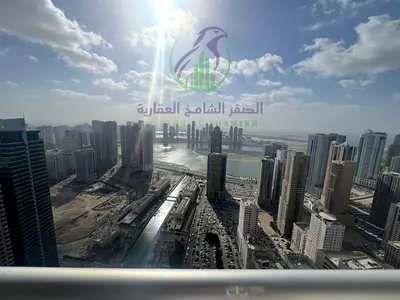 Two Bedroom Apartment for Annual Rent in Al Majaz Three Sharjah with Open Sea View Spacious Layout Storage Room Three Bathrooms Parking Gym and Swimmi