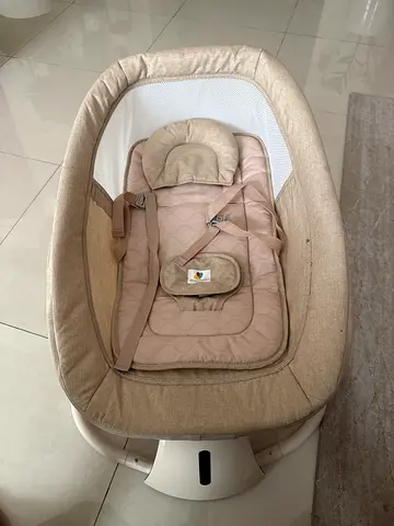 Used beige electric baby bassinet/rocker in good condition. Few months old. Pick up from ajman