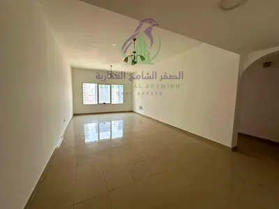 Two bedroom apartment with living room and one month free for annual rent in Al Mamzar Sharjah open view built in wardrobes modern finishes spacious l