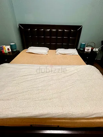 King size bed frame with storage, with padded headboard and two bedside tables