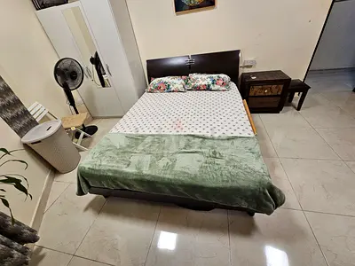Queen-size wooden bed frame
