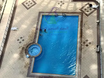 Two Bedroom Apartment with Living Room for Annual Rent in Al Mamzar Sharjah Free Parking Free Gym Free Swimming Pool Direct Access to Dubai Exit
