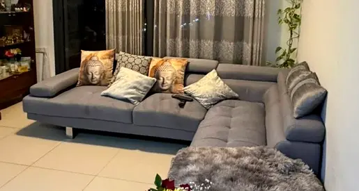 Large Grey L-Shaped Sectional
Sofa with Cushions (Optional)