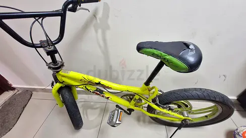 Used kids' yellow BMX-style bike - 16" wheels, single gear