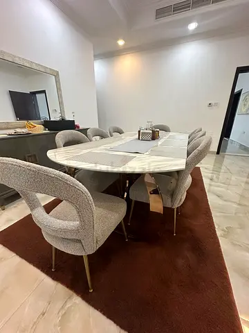 Marble Top Dining Table with 8 Upholstered Chairs - Good Condition